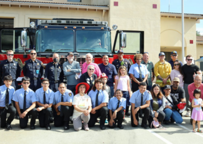 fire station 63 open house big group in front of fire truck officials and families WCCFSC 20250118