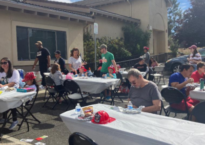 fire station 63 open house families resting at tables WCCFSC 20250118