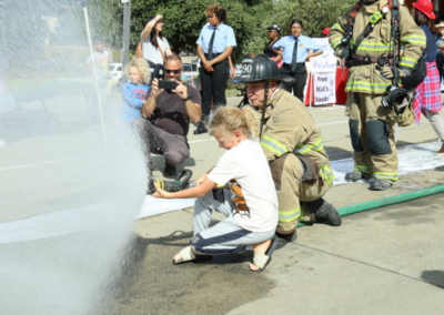 fire station 63 open house fireman demonstration releasing water from hose WCCFSC 20250118