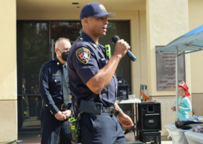 fire station 63 open house fireman in blue hat speaking WCCFSC 20250118