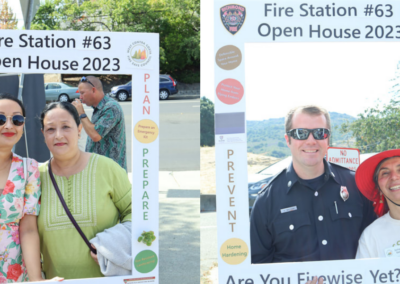 fire station 63 open house four people using cardboard cutout WCCFSC 20250118