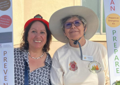 fire station 63 open house smiling volunteers cardboard sign WCCFSC 20250118