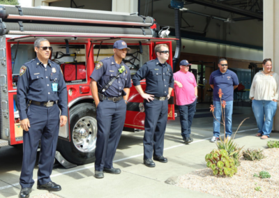 fire station 63 open house three fireman in front of fire truck posed WCCFSC 20250118