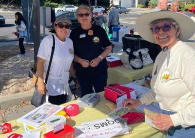 fire station 63 open house three volunteers at table WCCFSC 20250118