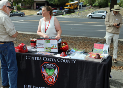 fire station 63 open house woman answering mans questions WCCFSC 20250118