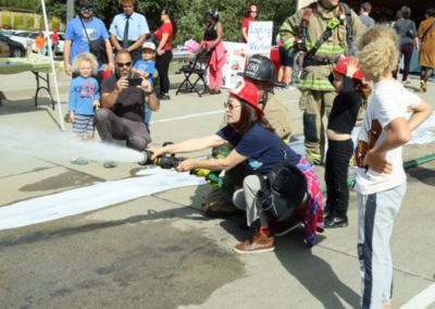 fire station 63 open house fireman demonstration releasing water from hose WCCFSC 20250118